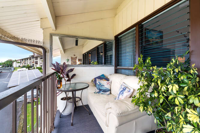 79-7199 Kona Coffee Villas, Unit 315 Holualoa, HI 96725 - Photo 10 of 28 a view of a porch with furniture and a potted plant