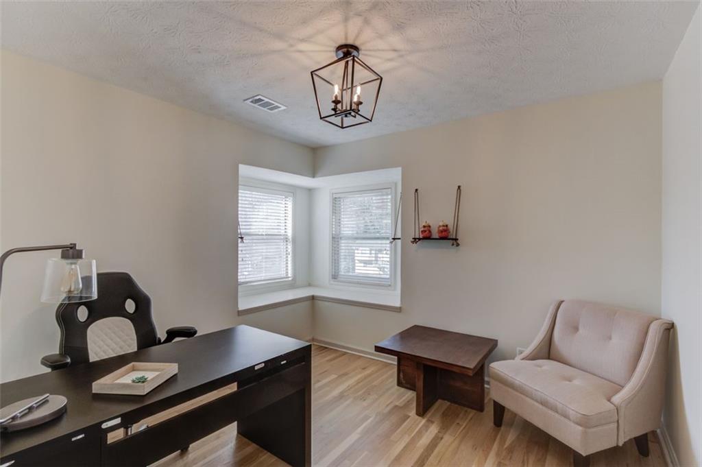 2965 Cordite Loop Snellville, GA 30039 - Photo 19 of 45 a view of a workspace with furniture and a window