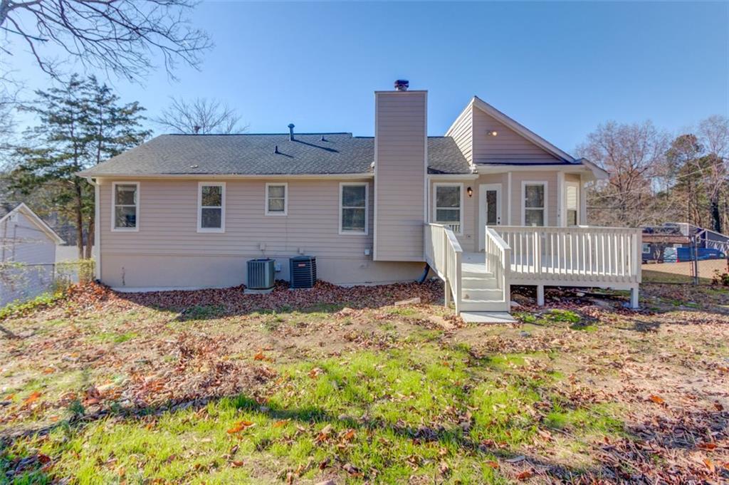 2965 Cordite Loop Snellville, GA 30039 - Photo 43 of 45 a house that has a tree in front of it