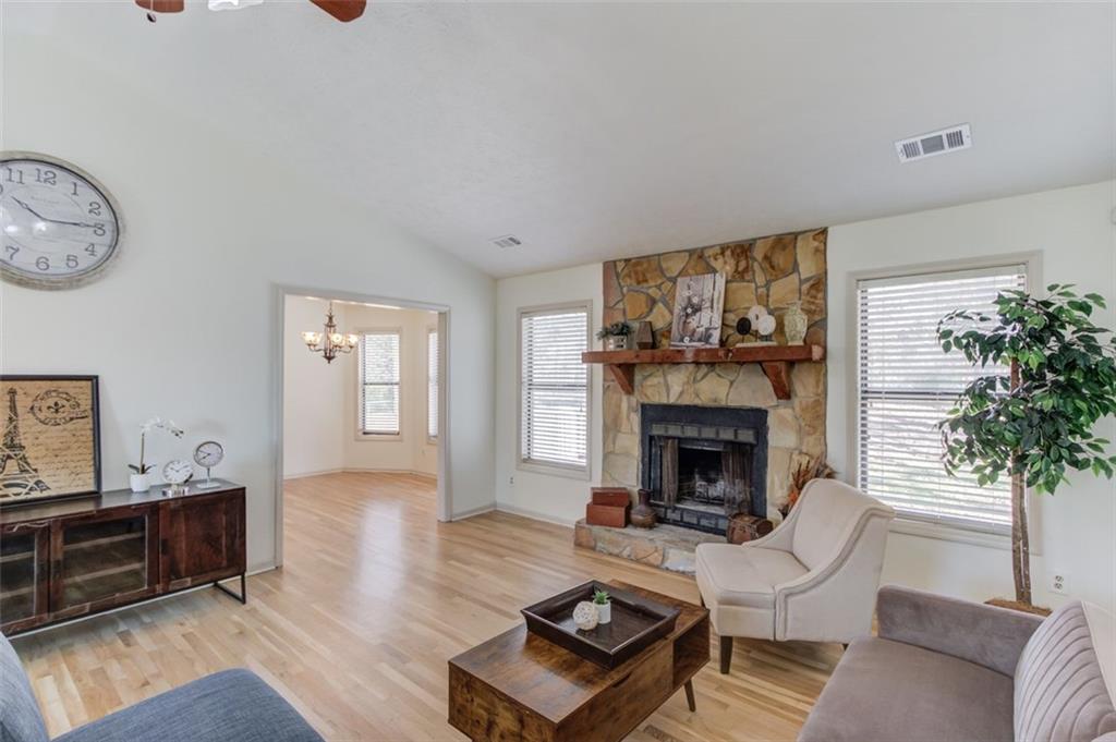 2965 Cordite Loop Snellville, GA 30039 - Photo 9 of 45 a living room with furniture and a fireplace