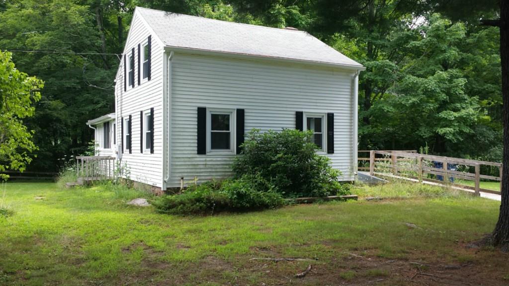 293 North Granby Road Granby, CT 06035 - Photo 1 of 1 a house that has a big yard and large trees