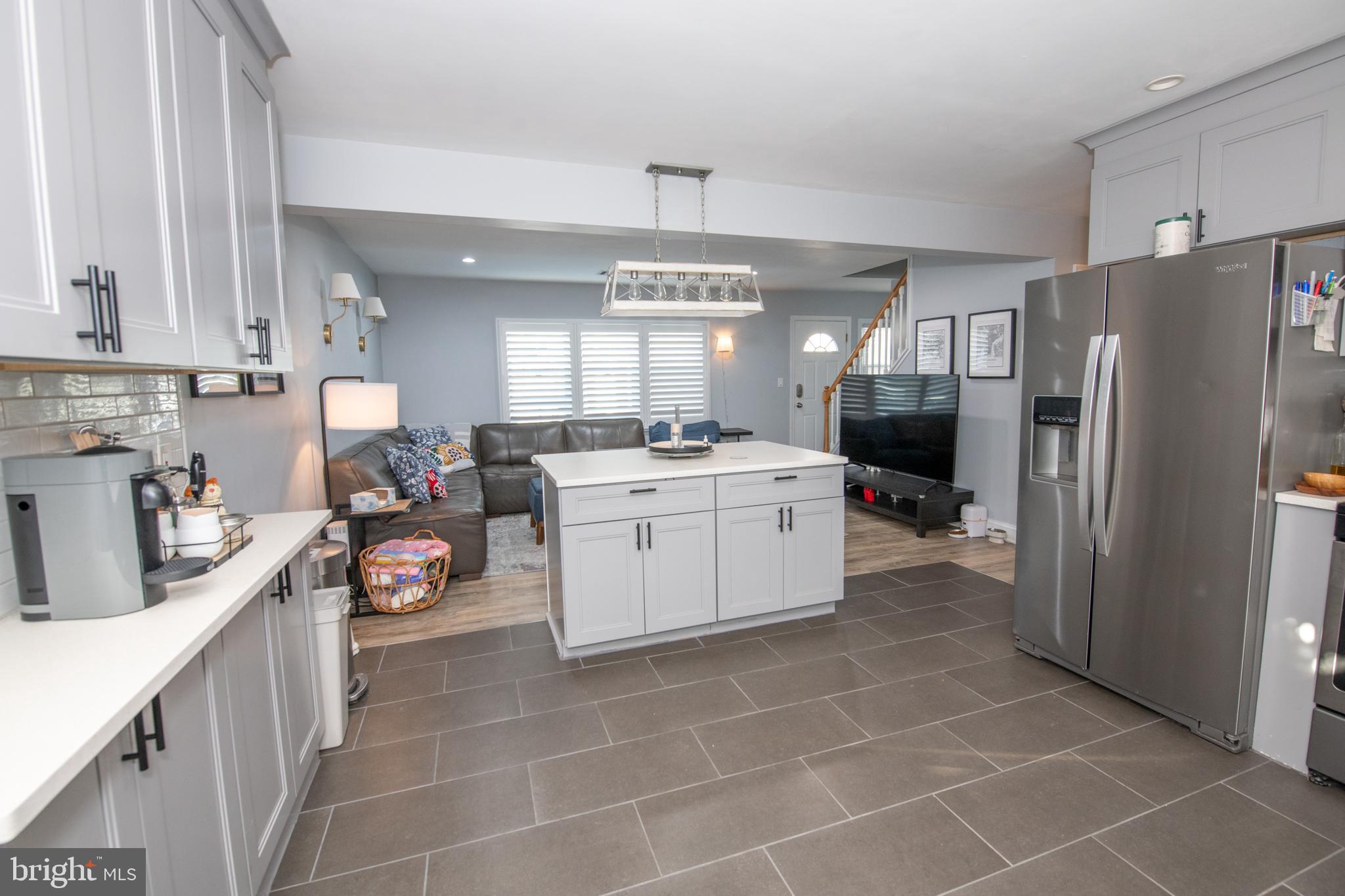 9304 Treaty Road Philadelphia, PA 19114 - Photo 14 of 43 a kitchen with a sink a refrigerator and window