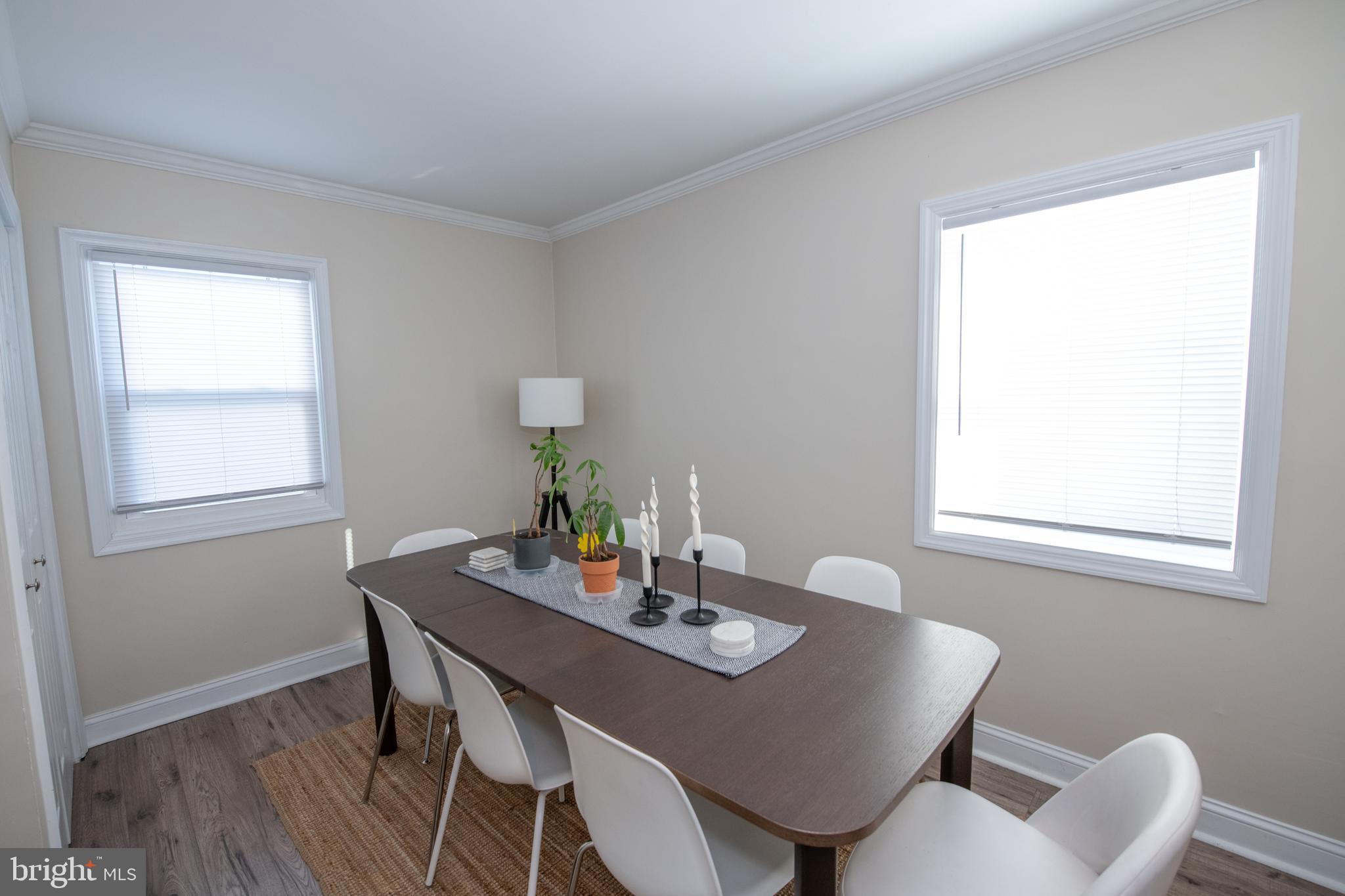 9304 Treaty Road Philadelphia, PA 19114 - Photo 17 of 43 a view of a dining room with furniture window and wooden floor