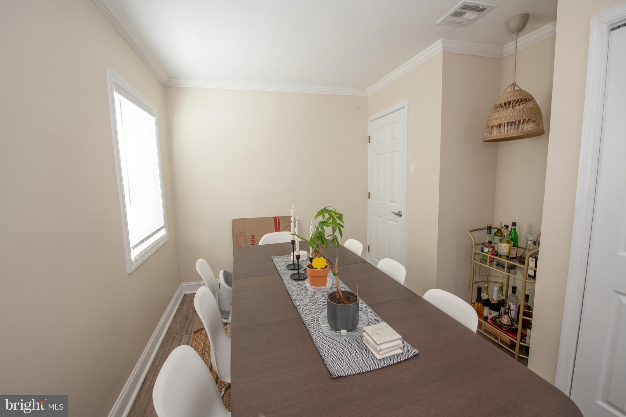 9304 Treaty Road Philadelphia, PA 19114 - Photo 20 of 43 a view of living room with furniture and flowers