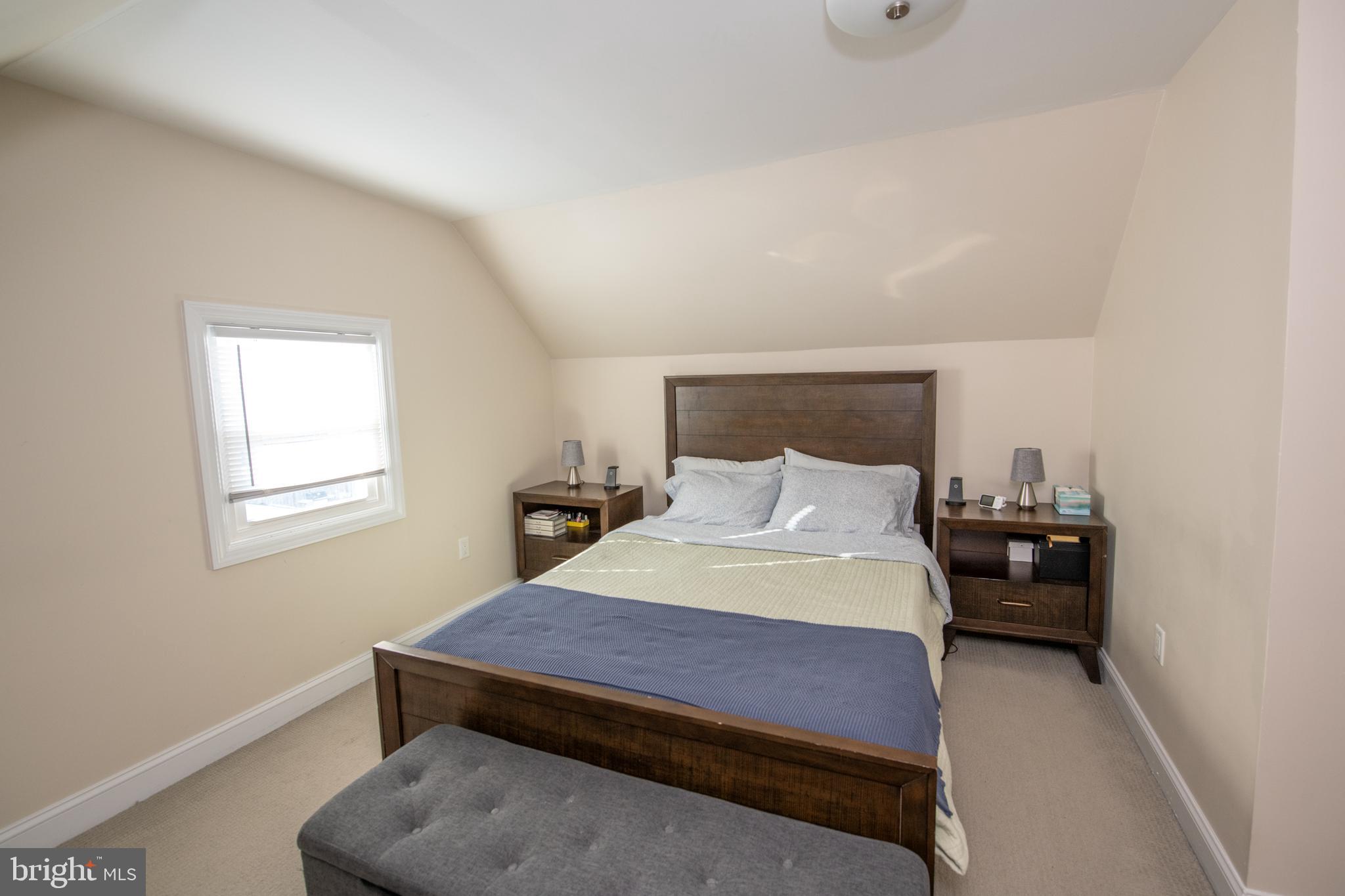 9304 Treaty Road Philadelphia, PA 19114 - Photo 26 of 43 a bedroom with a bed and window