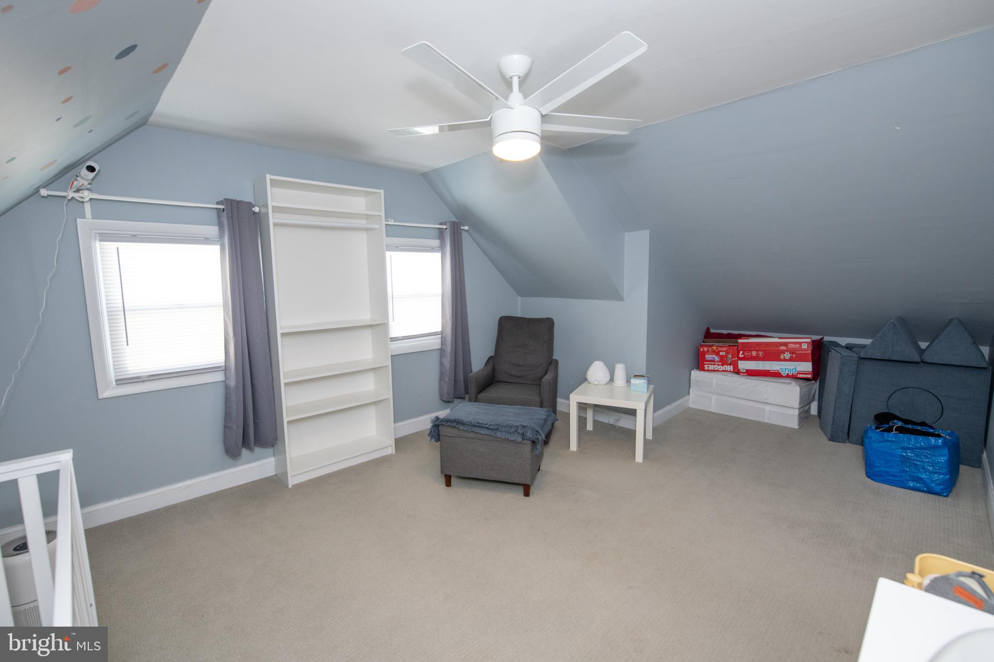 9304 Treaty Road Philadelphia, PA 19114 - Photo 31 of 43 a living room with furniture and a chandelier