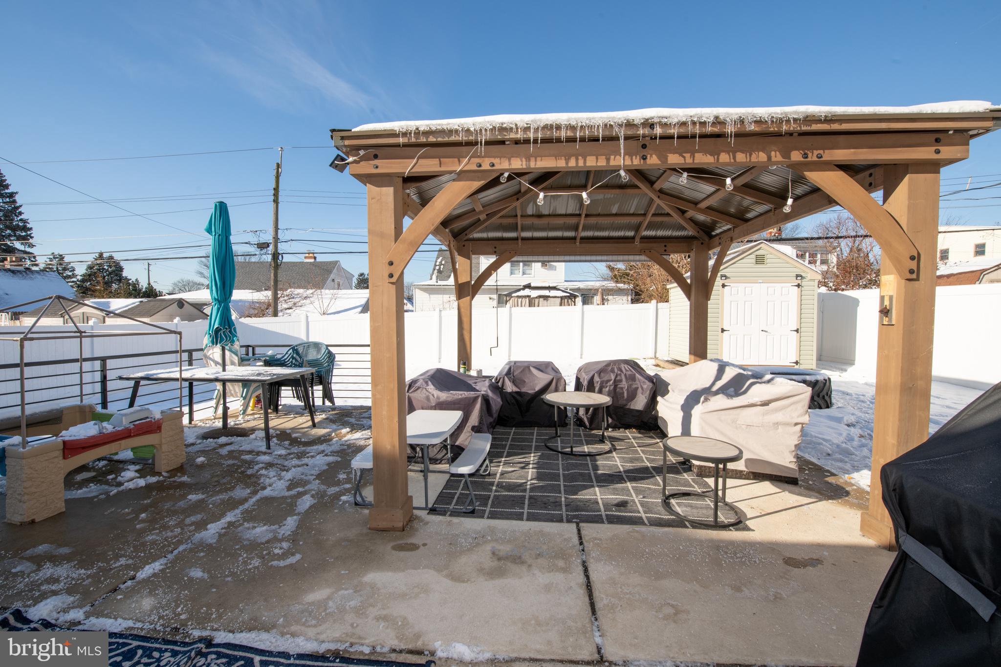 9304 Treaty Road Philadelphia, PA 19114 - Photo 37 of 43 a view of chairs and table in patio