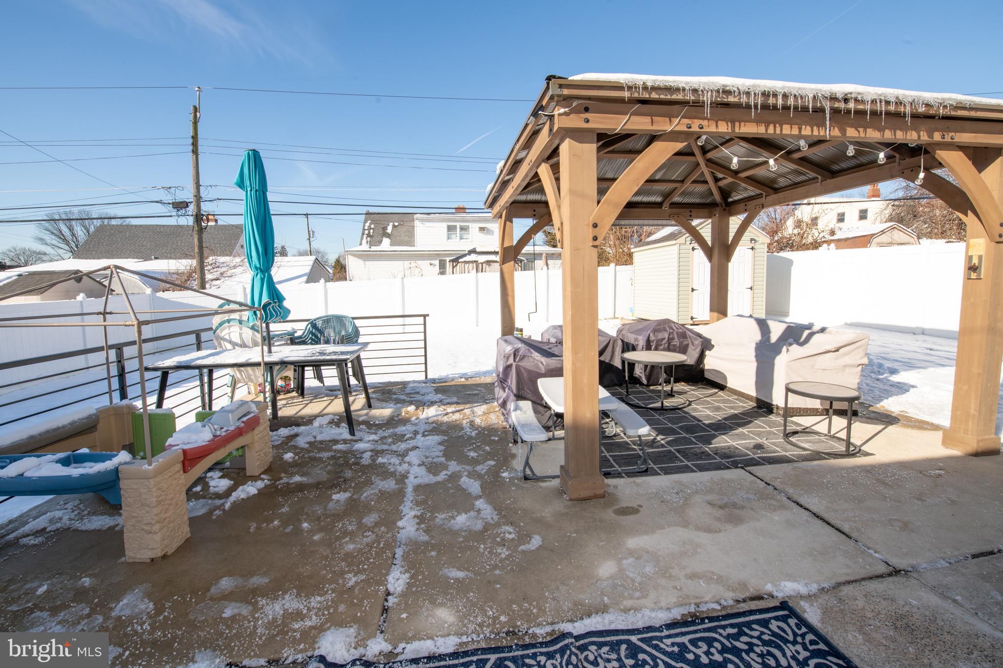 9304 Treaty Road Philadelphia, PA 19114 - Photo 38 of 43 a view of a patio with a table and chairs