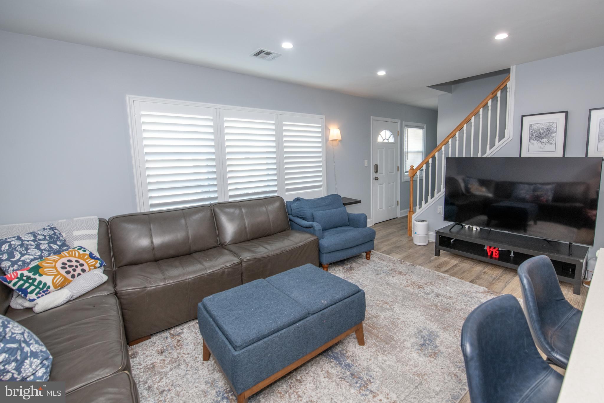 9304 Treaty Road Philadelphia, PA 19114 - Photo 7 of 43 a living room with furniture and a flat screen tv