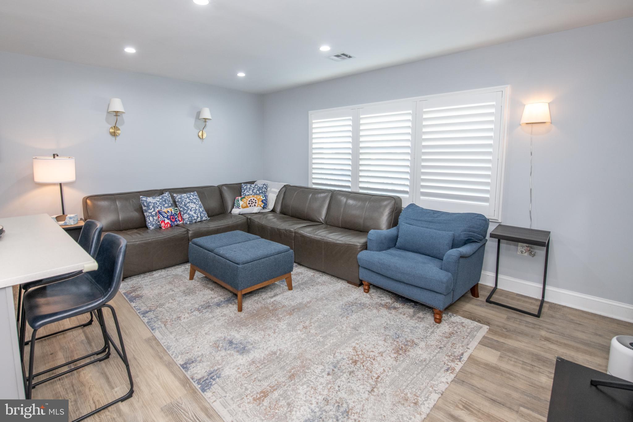 9304 Treaty Road Philadelphia, PA 19114 - Photo 8 of 43 a living room with a couch and a large window