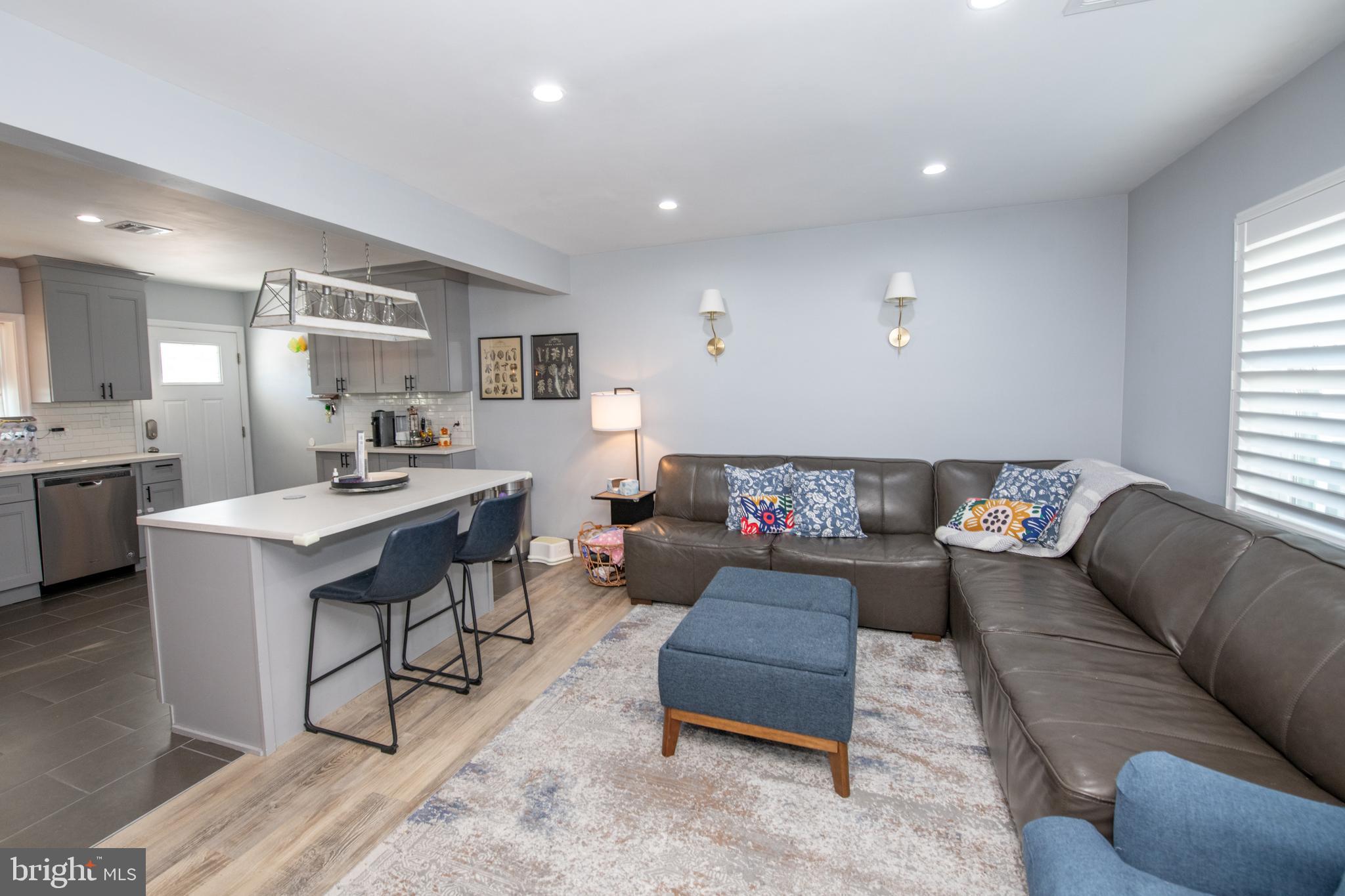 9304 Treaty Road Philadelphia, PA 19114 - Photo 9 of 43 a living room with furniture and view of kitchen