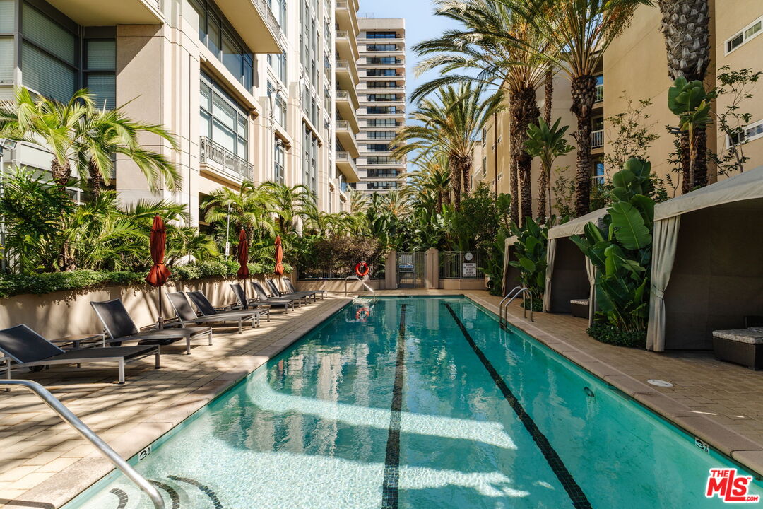 10800 Wilshire Boulevard, Unit 502 Los Angeles, CA 90024 - Photo 21 of 29 a view of swimming pool with chairs