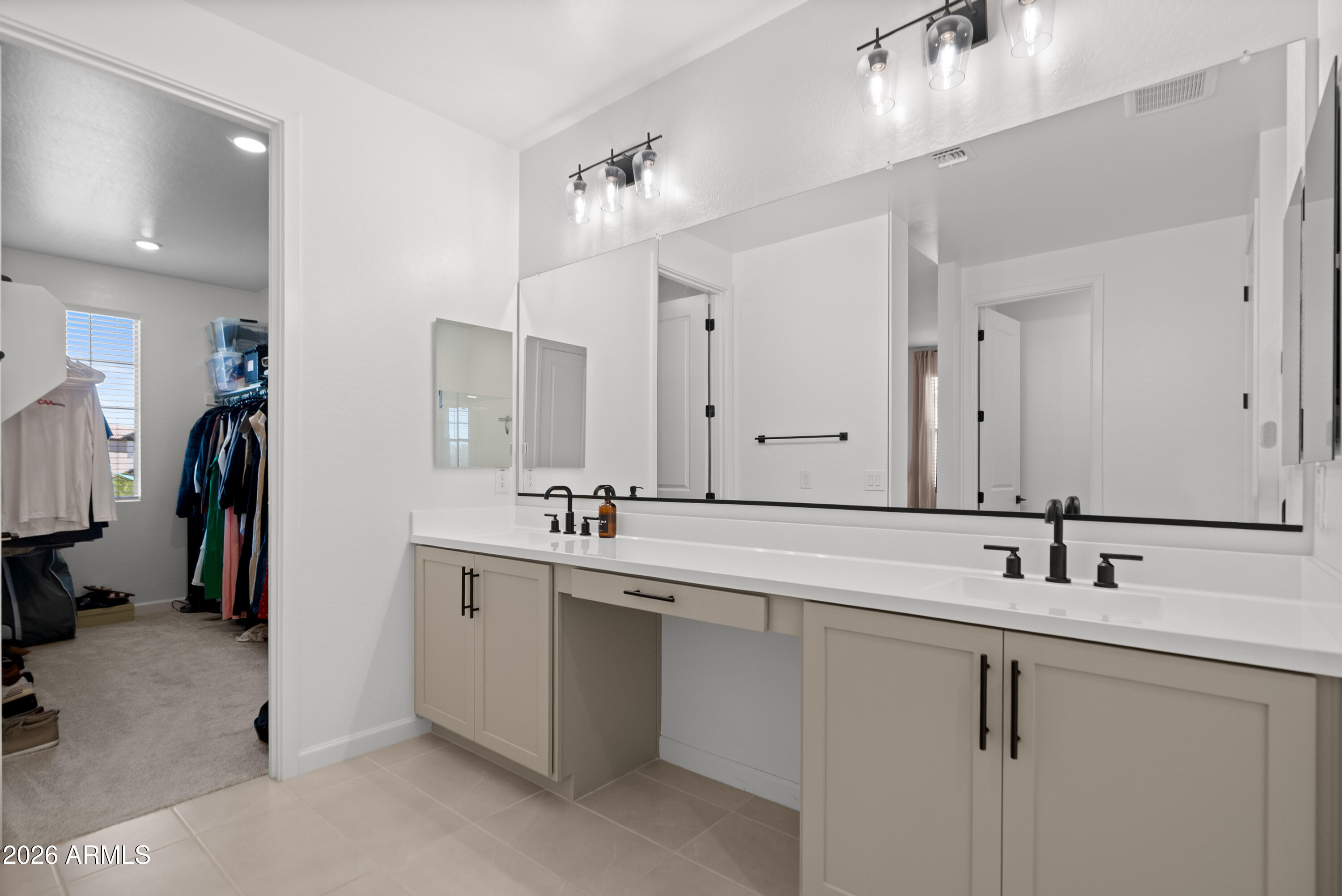 1989 West Hide Trail Phoenix, AZ 85085 - Photo 20 of 41 a bathroom with a double vanity sink a and a mirror