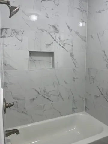 a bathroom with a bathtub