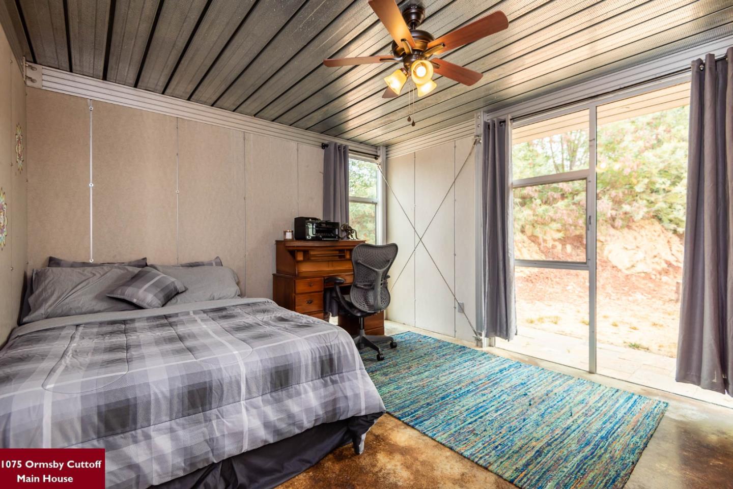 1075 Ormsby Cutoff Watsonville, CA 95076 - Photo 18 of 30 a bedroom with a bed and a window