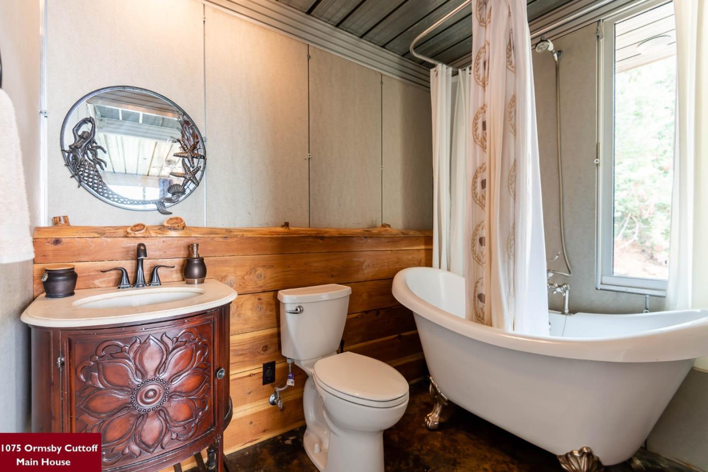 1075 Ormsby Cutoff Watsonville, CA 95076 - Photo 21 of 30 a bathroom with a sink and a mirror