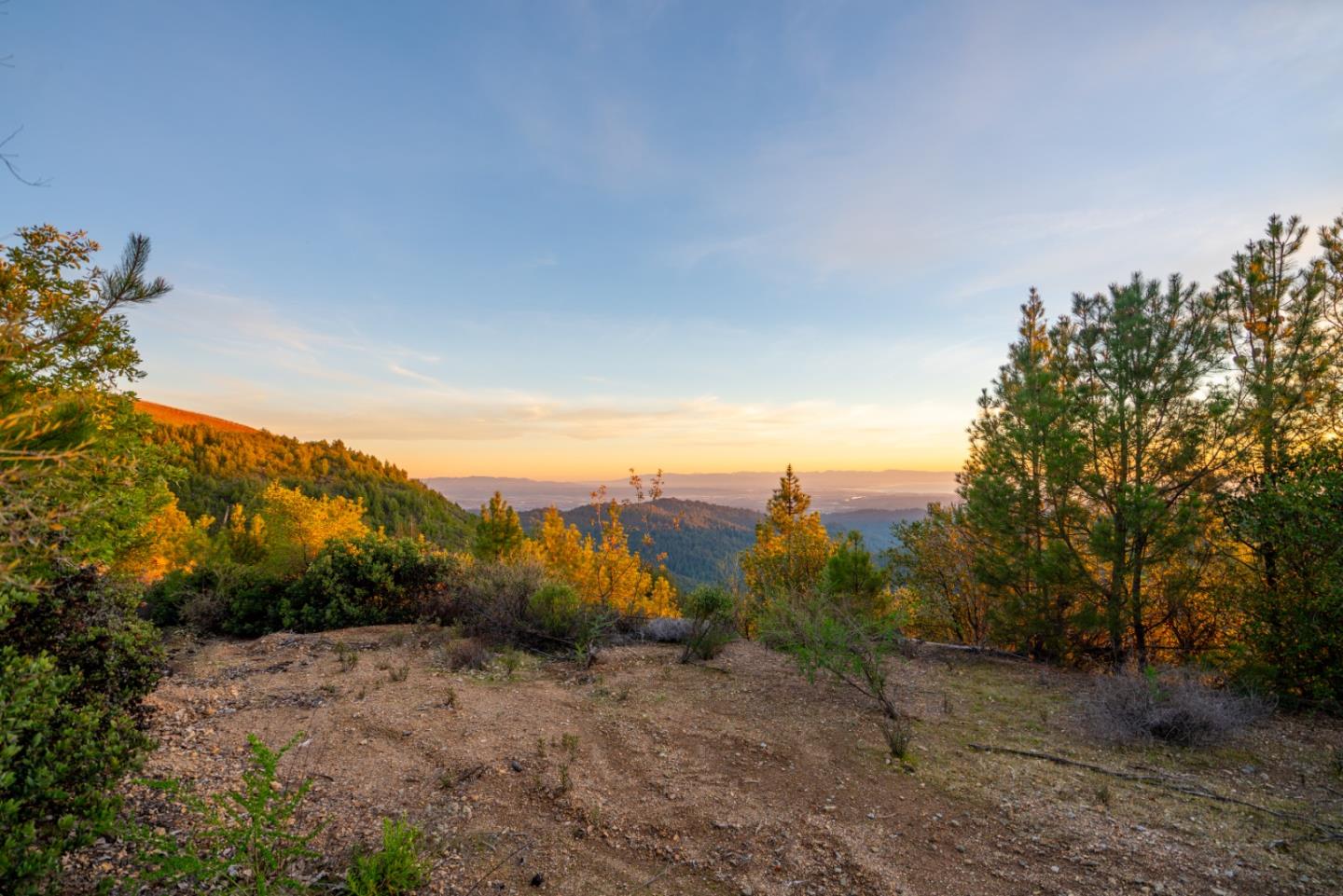 1075 Ormsby Cutoff Watsonville, CA 95076 - Photo 28 of 30 a view of a dry yard with mountains in the background