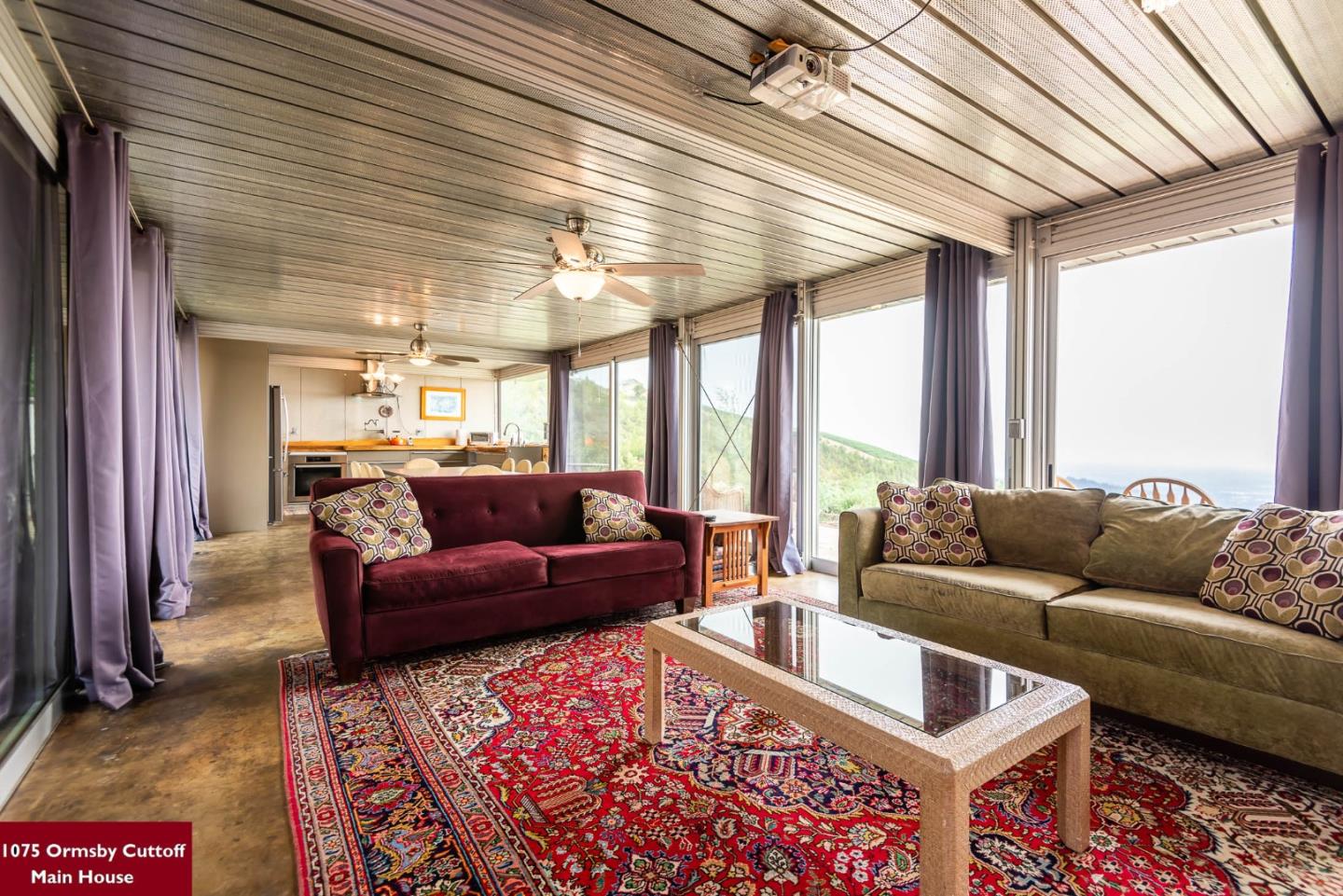 1075 Ormsby Cutoff Watsonville, CA 95076 - Photo 10 of 30 a living room with furniture and a large window