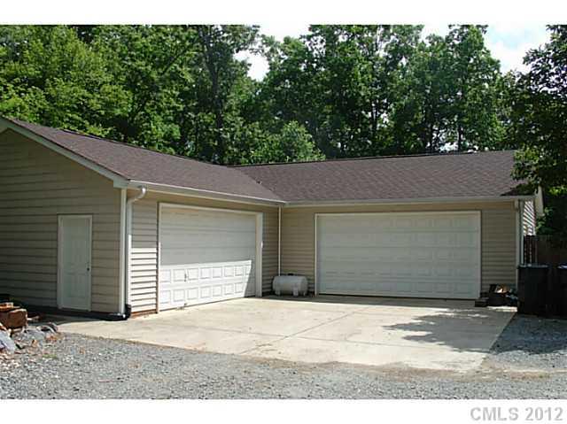 8109 Pine Oak Road Waxhaw, NC 28173 - Photo 12 of 16 a backyard of a house