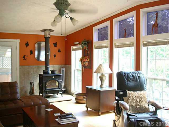 8109 Pine Oak Road Waxhaw, NC 28173 - Photo 8 of 16 a living room with furniture and a window