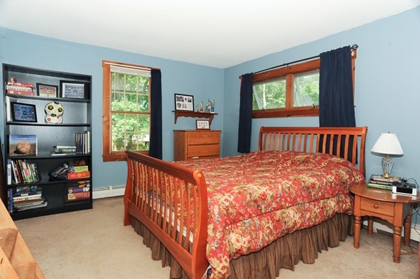 72 Bushy Lane Rutland, MA 01543 - Photo 16 of 29 a bedroom with a bed and a window
