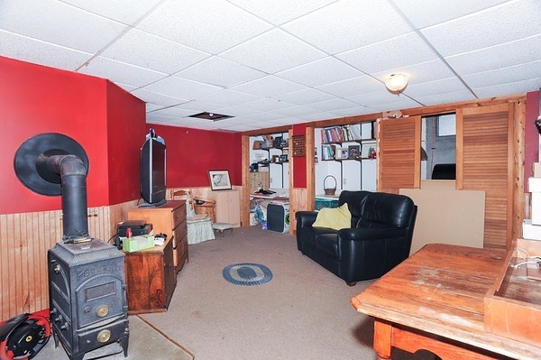 72 Bushy Lane Rutland, MA 01543 - Photo 20 of 29 a living room with furniture a rug and a large window