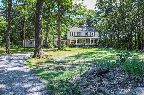 72 Bushy Lane Rutland, MA 01543 - Photo 2 of 29 a view of a house with a yard