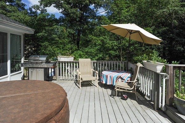72 Bushy Lane Rutland, MA 01543 - Photo 24 of 29 a view of a deck with furniture and yard
