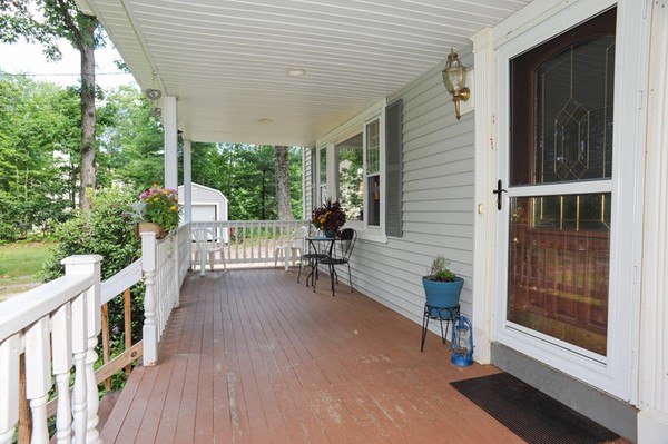 72 Bushy Lane Rutland, MA 01543 - Photo 3 of 29 a view of a house with backyard and porch