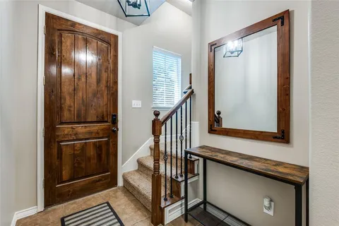 a view of an entryway with a door