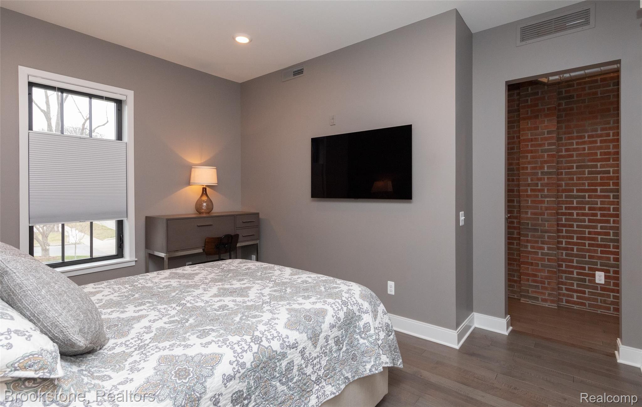 804 North Main Street, Unit 2E(#7) Rochester, MI 48307 - Photo 13 of 24 Spacious Bedroom with Wall Mount for TV
