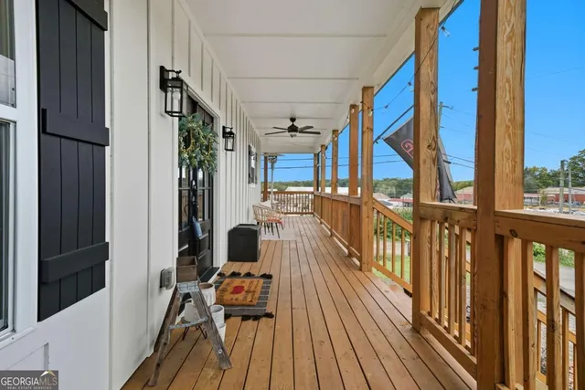 a view of balcony with furniture