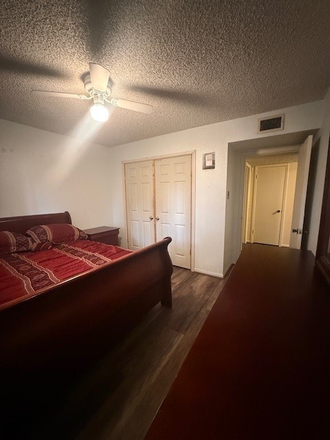 16714 Rockbend Houston, TX 77084 - Photo 14 of 19 a bedroom with a bed and a lamp