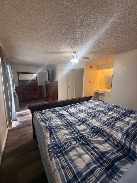 16714 Rockbend Houston, TX 77084 - Photo 10 of 19 a bedroom with a bed and painting on the wall