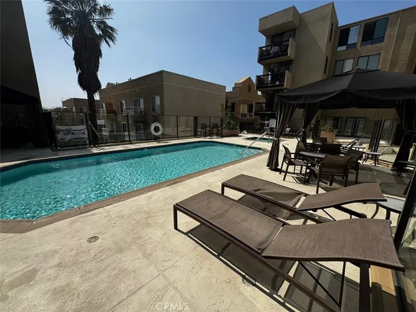a view of living room with a wooden floor