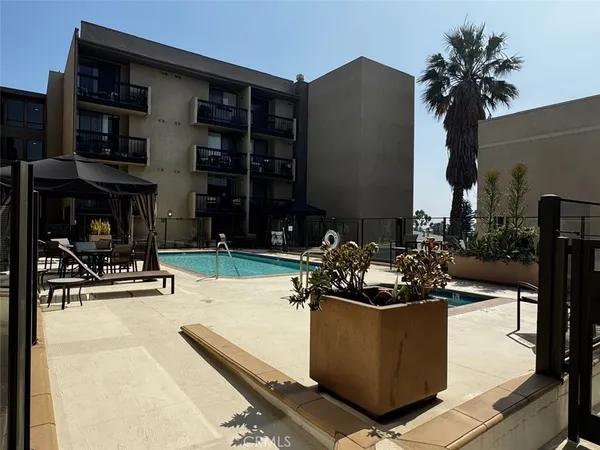 a room with gym equipment and a window