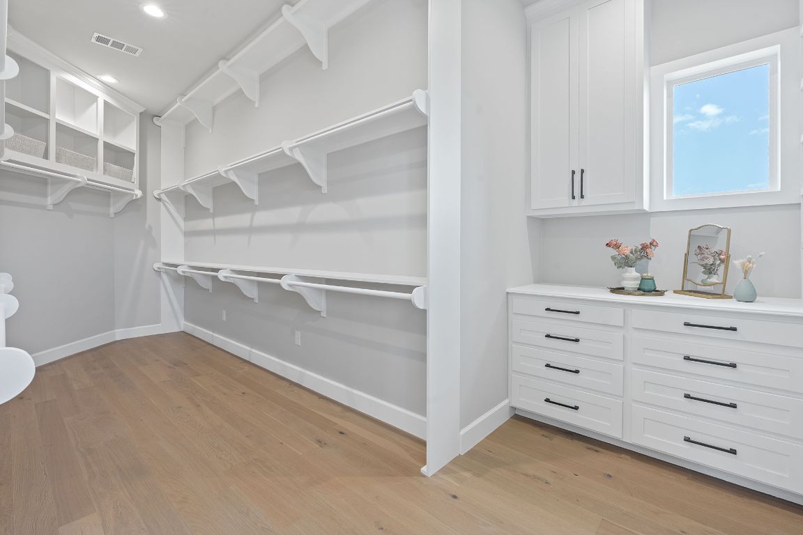 713 San Gabriel Ranch Road Liberty Hill, TX 78642 - Photo 34 of 40 a view of an empty walk in closet