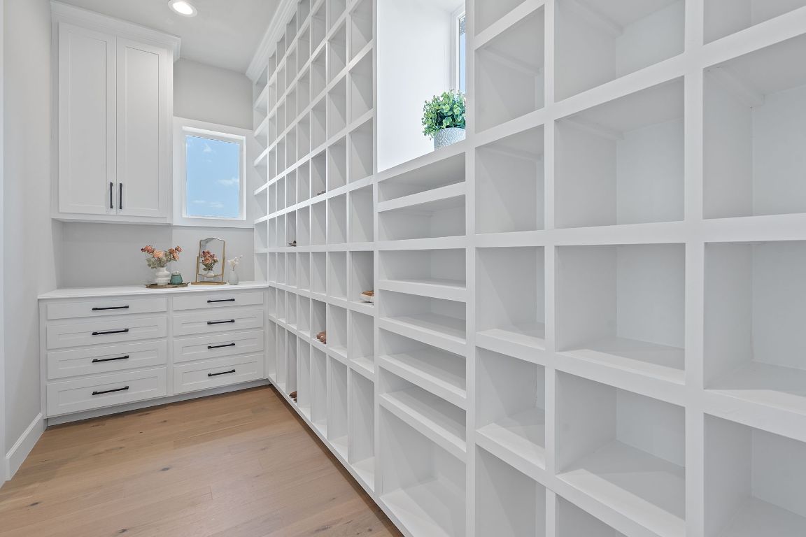713 San Gabriel Ranch Road Liberty Hill, TX 78642 - Photo 35 of 40 a view of an empty walk in closet