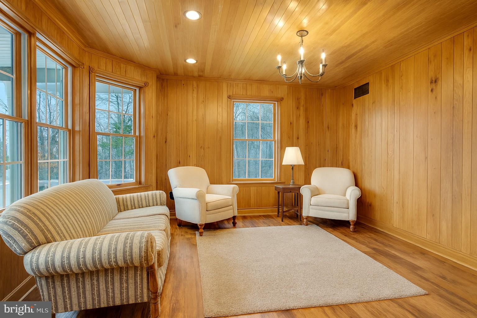 7848 Rte 104 Mount Pleasant Mills, PA 17853 - Photo 11 of 54 a living room with furniture and a large window