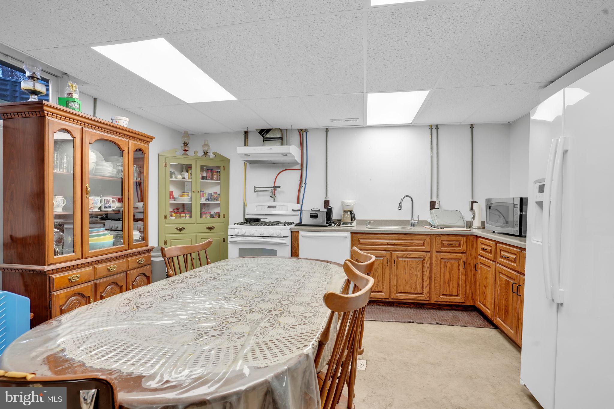7848 Rte 104 Mount Pleasant Mills, PA 17853 - Photo 31 of 54 a kitchen with stainless steel appliances granite countertop a sink counter space and a window