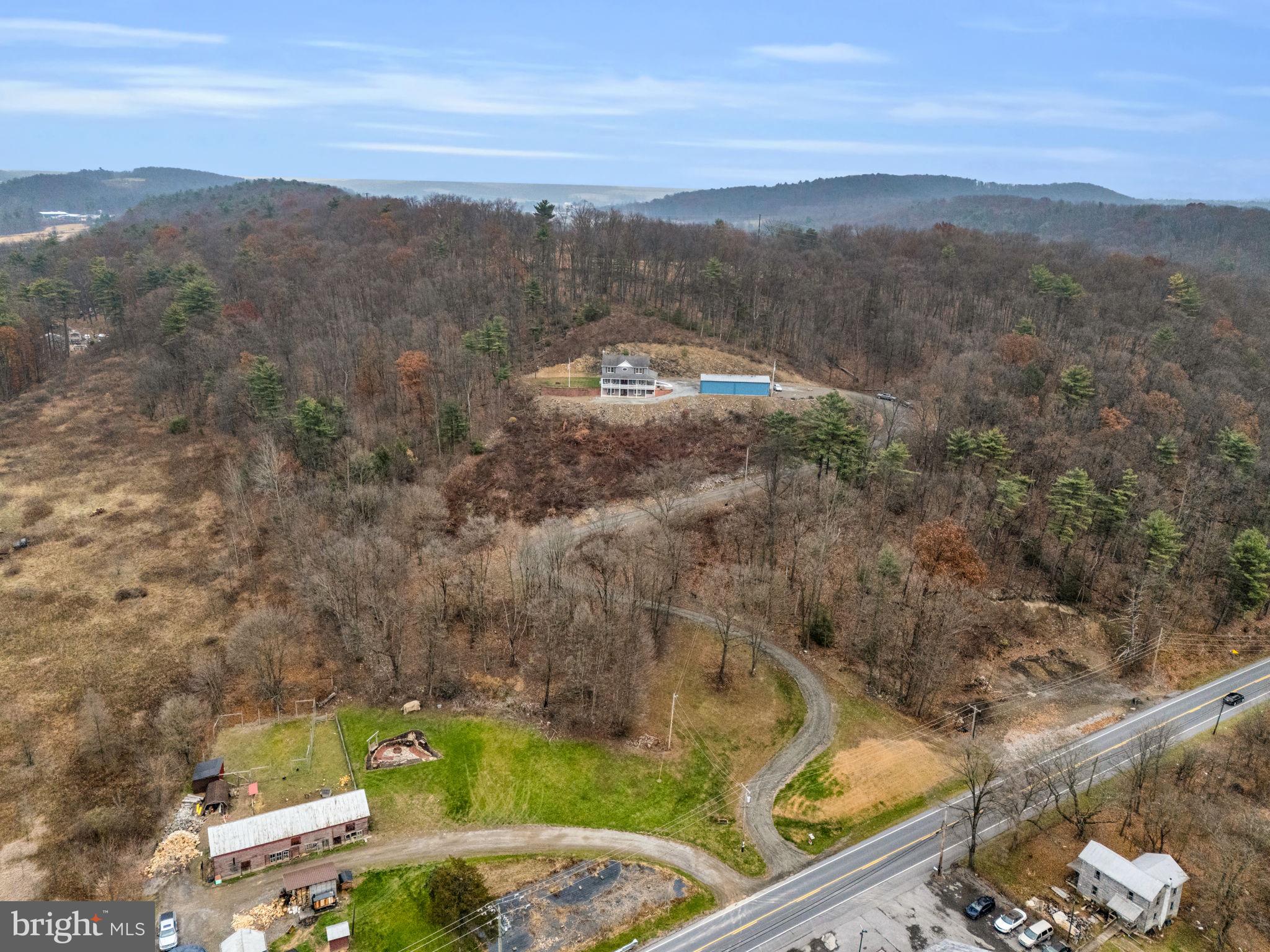 7848 Rte 104 Mount Pleasant Mills, PA 17853 - Photo 49 of 54 a view of a city with mountain