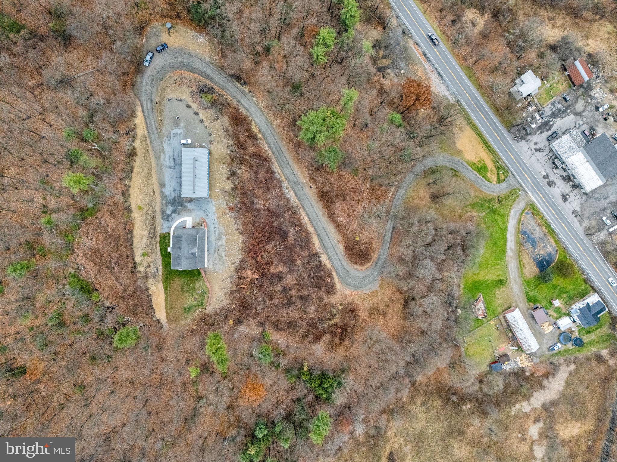 7848 Rte 104 Mount Pleasant Mills, PA 17853 - Photo 50 of 54 a view of a pathway of a house with a yard