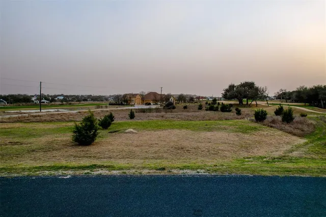 a view of a lake with a city
