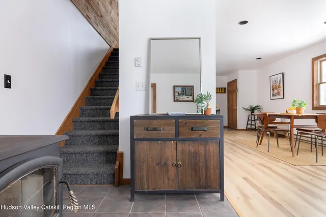a view of dining room and hall with furniture