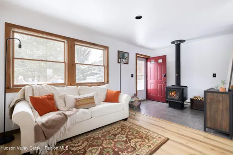 a living room with furniture and a window