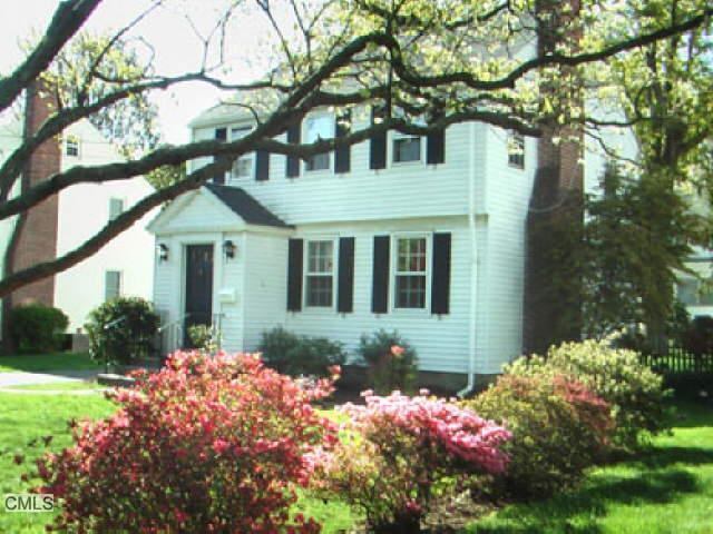95 Northfield Road Fairfield, CT 06824 - Photo 1 of 1 a front view of a house with a yard