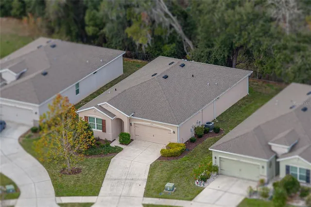 a kitchen with stainless steel appliances granite countertop a stove sink and cabinets
