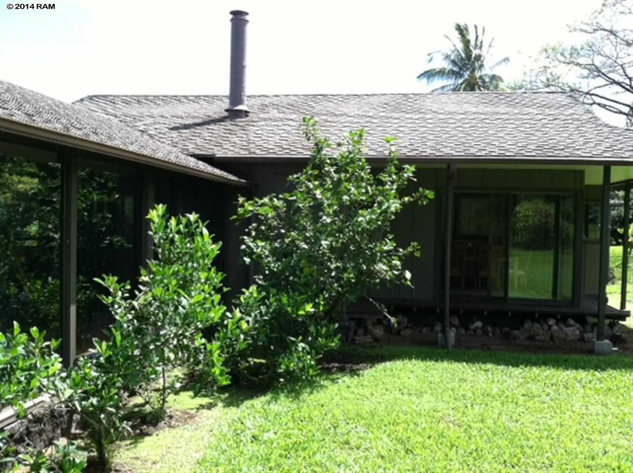 60 Kalo Road, Unit 19 Hana, HI 96713 - Photo 17 of 30 a front view of a house with garden