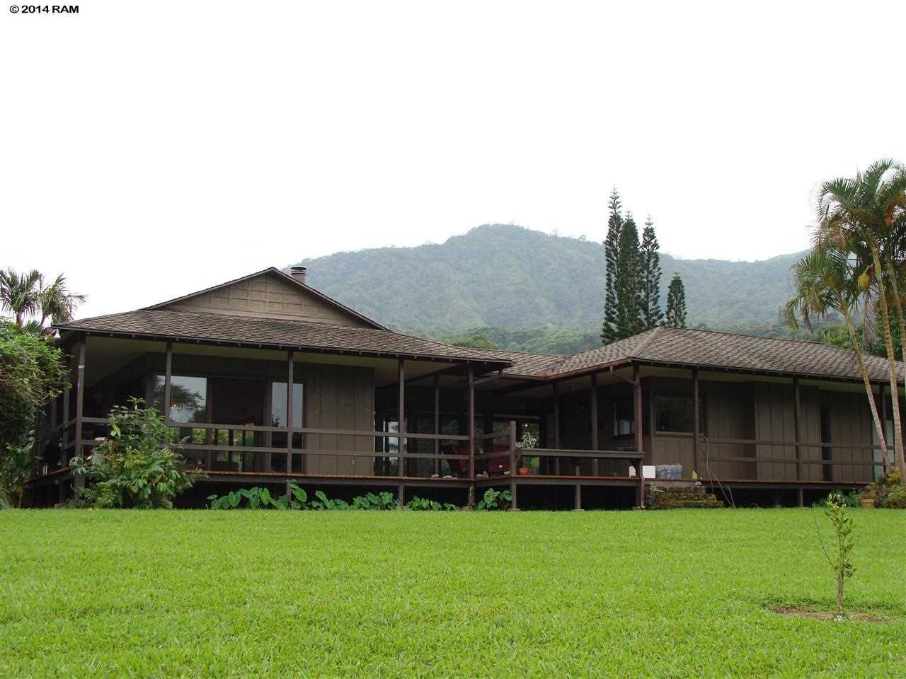 60 Kalo Road, Unit 19 Hana, HI 96713 - Photo 4 of 30 a front view of a house with a yard