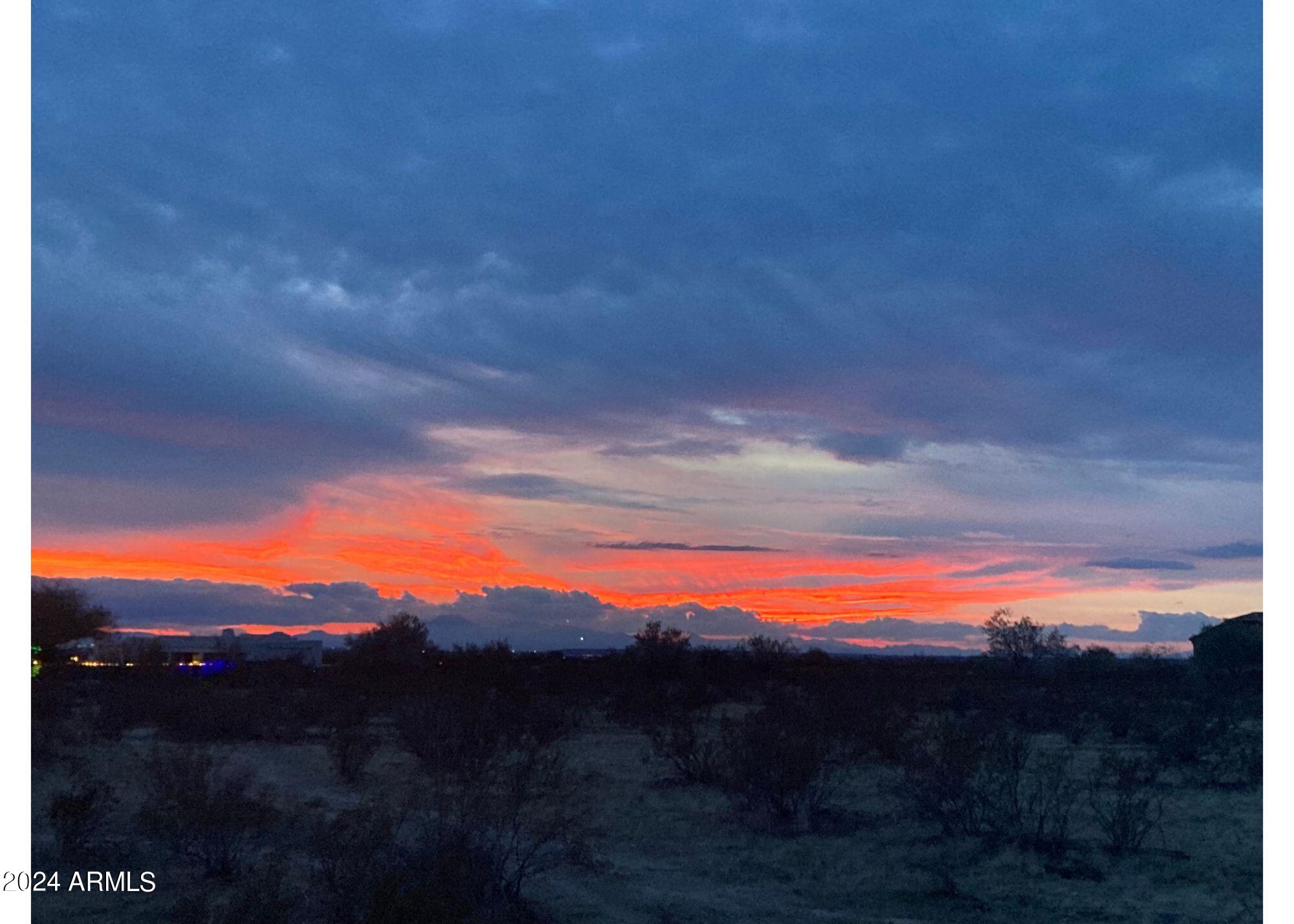 0 West Rhodes Way, Unit 28 Casa Grande, AZ 85194 - Photo 8 of 12 a sunset view with ocean view